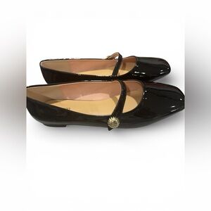 Chanel Black Flats with Gold Detail